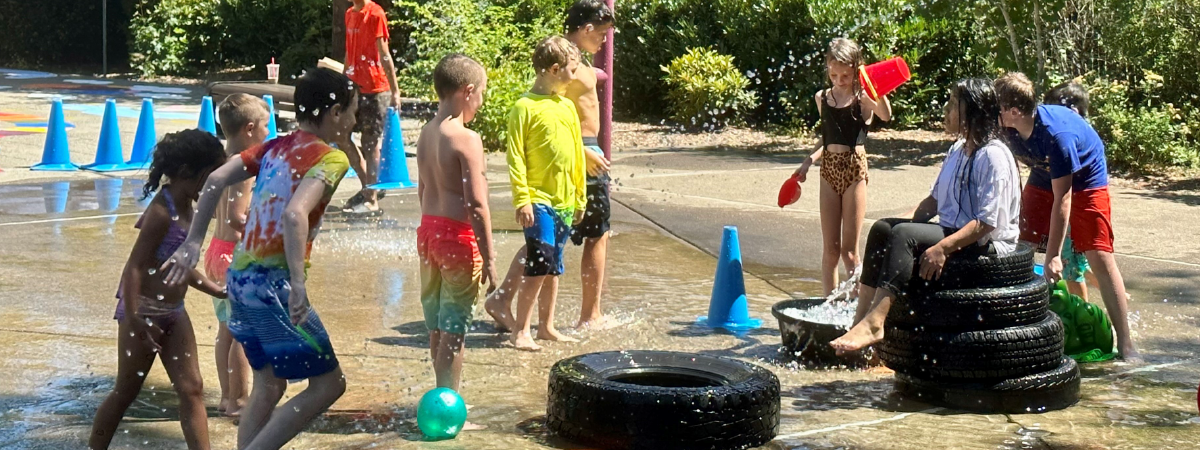 Kids playing at the Aquatic Center Spray Park